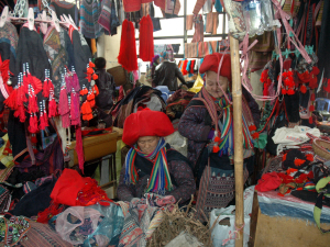 Sapa: Women in Bac Ha Market Vietnam Adventure Tours: Untouched Ha Giang And Bac Ha Hiking Expedition