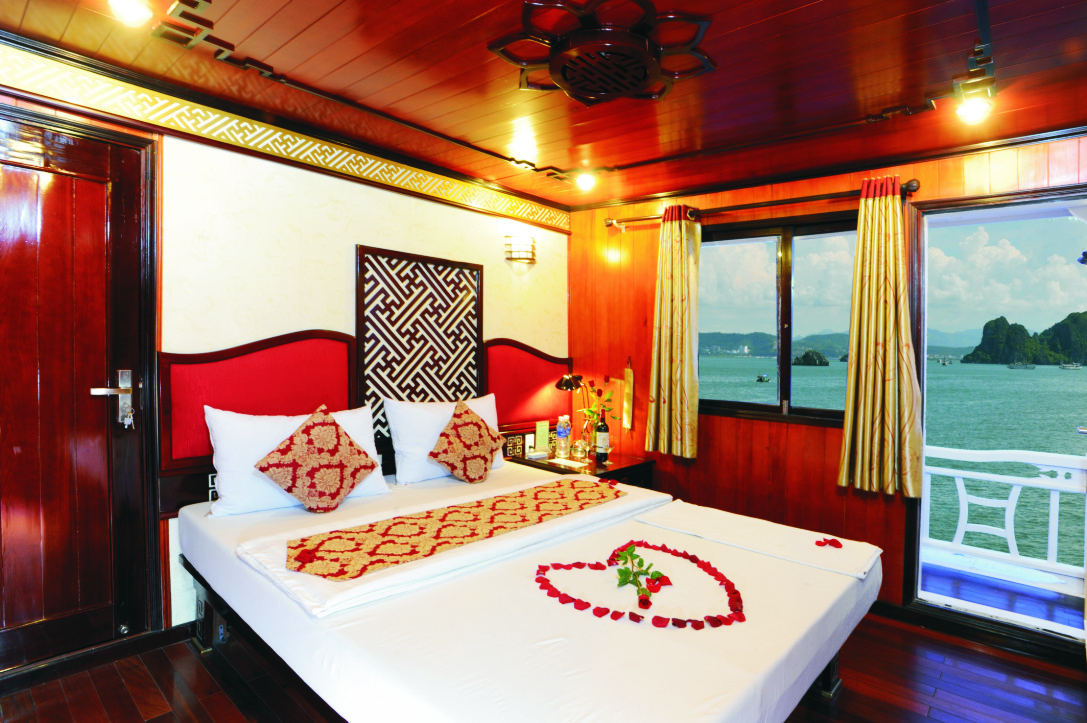 Honeymoon cabin Halong cruise tours: royal heritage cruise with bai tu long bay exploration