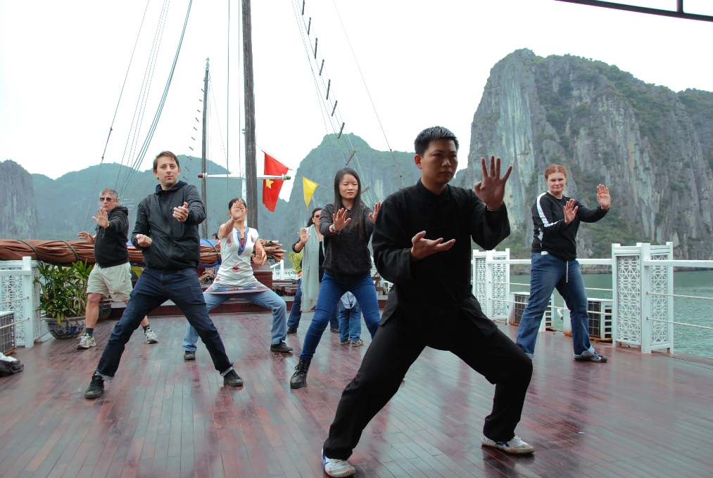 Taichi in early morning on cruise Halong cruise tours: 2-day halong bay on v'spirit classic cruise