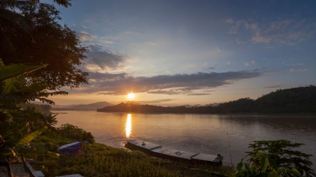 Sunset at mekong river 1 | upstream mekong river cruise tour from vietnam to cambodia - 10 days