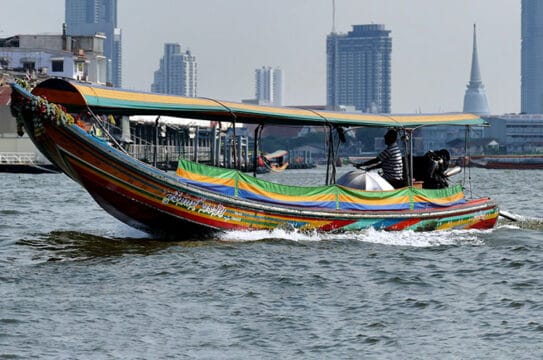 Must-do activities in bangkok for adventure seekers Chao phraya on a longtail boat | must-do activities in bangkok for adventure seekers